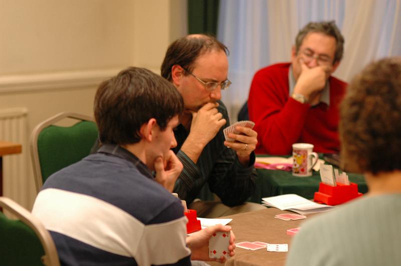 Picture 025.jpg - London professional Jon Cooke in thought against John Atthey, the winner of this  year's Brighton Swiis Pairs. London committee member Dave Muller gets ready to enter the play on Bridgebase